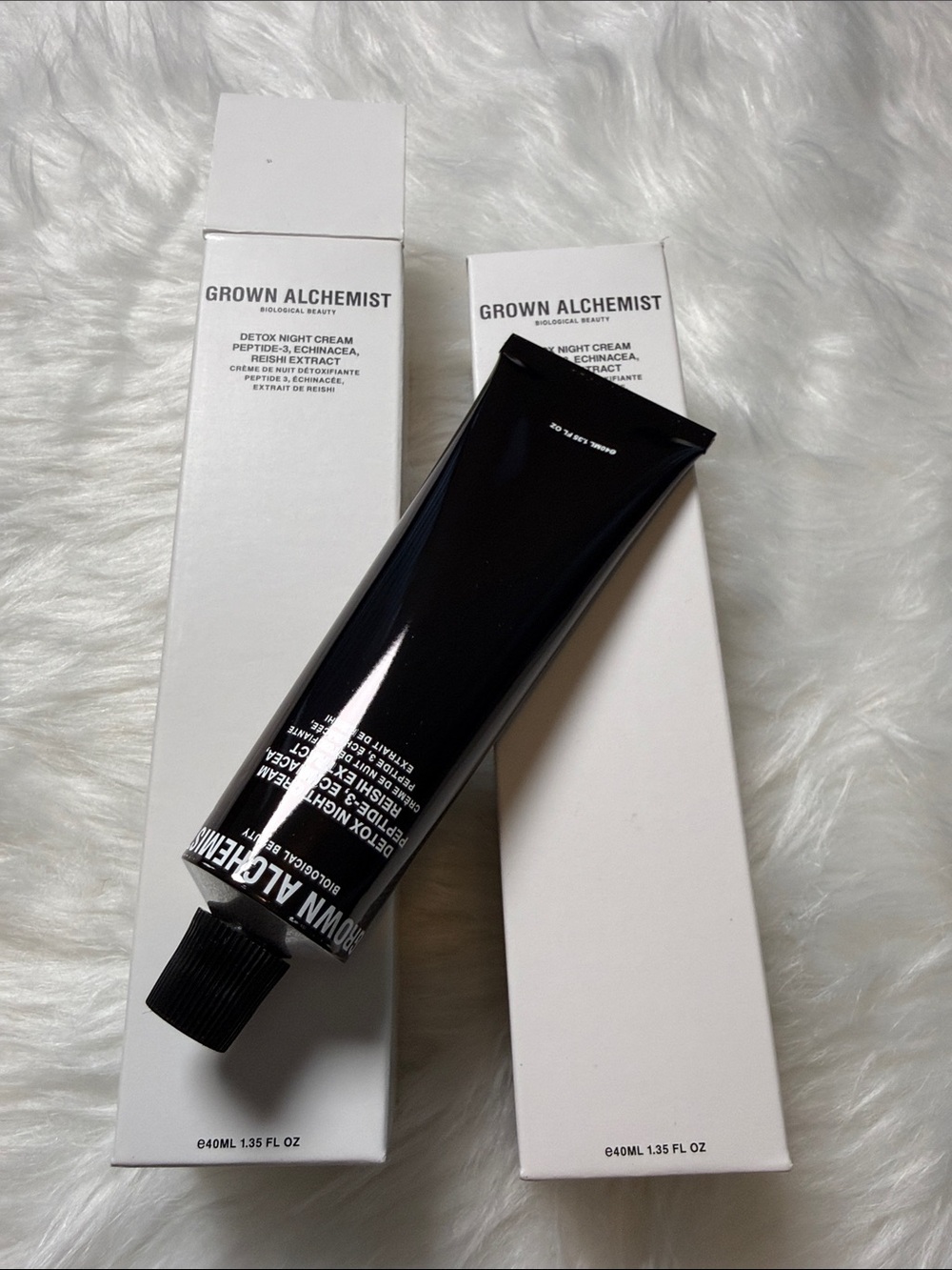 Grown Alchemist Black Skincare Tube with White Text